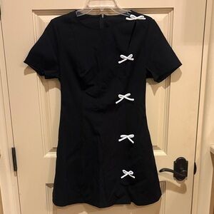 Black Dress with White Bow Accents